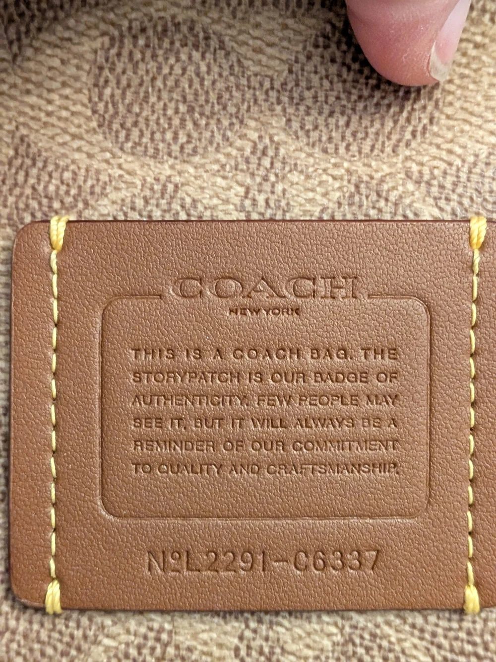 COACH Signature Canvas Wristlet with Yellow Trim